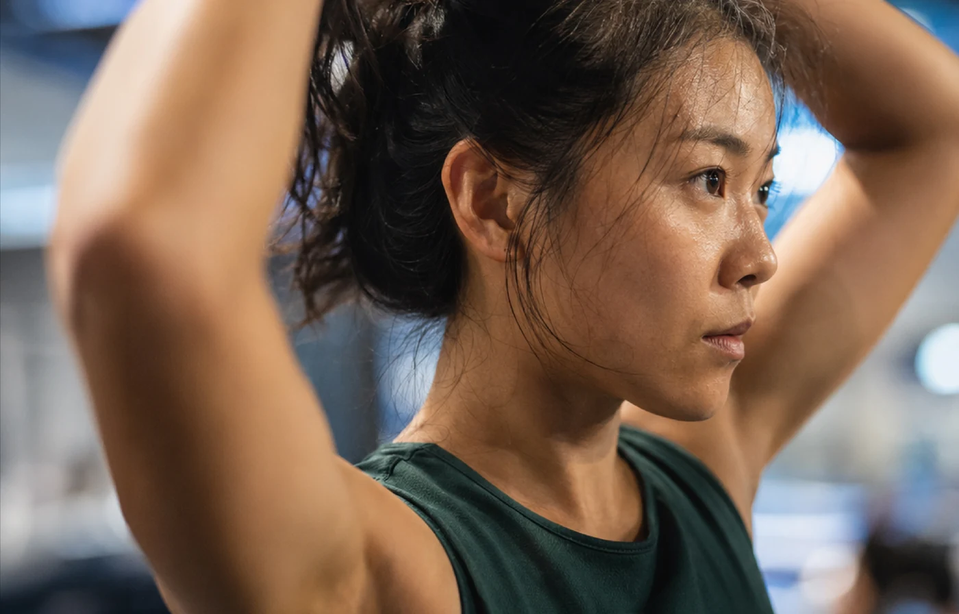 A focused athlete warming up before a workout